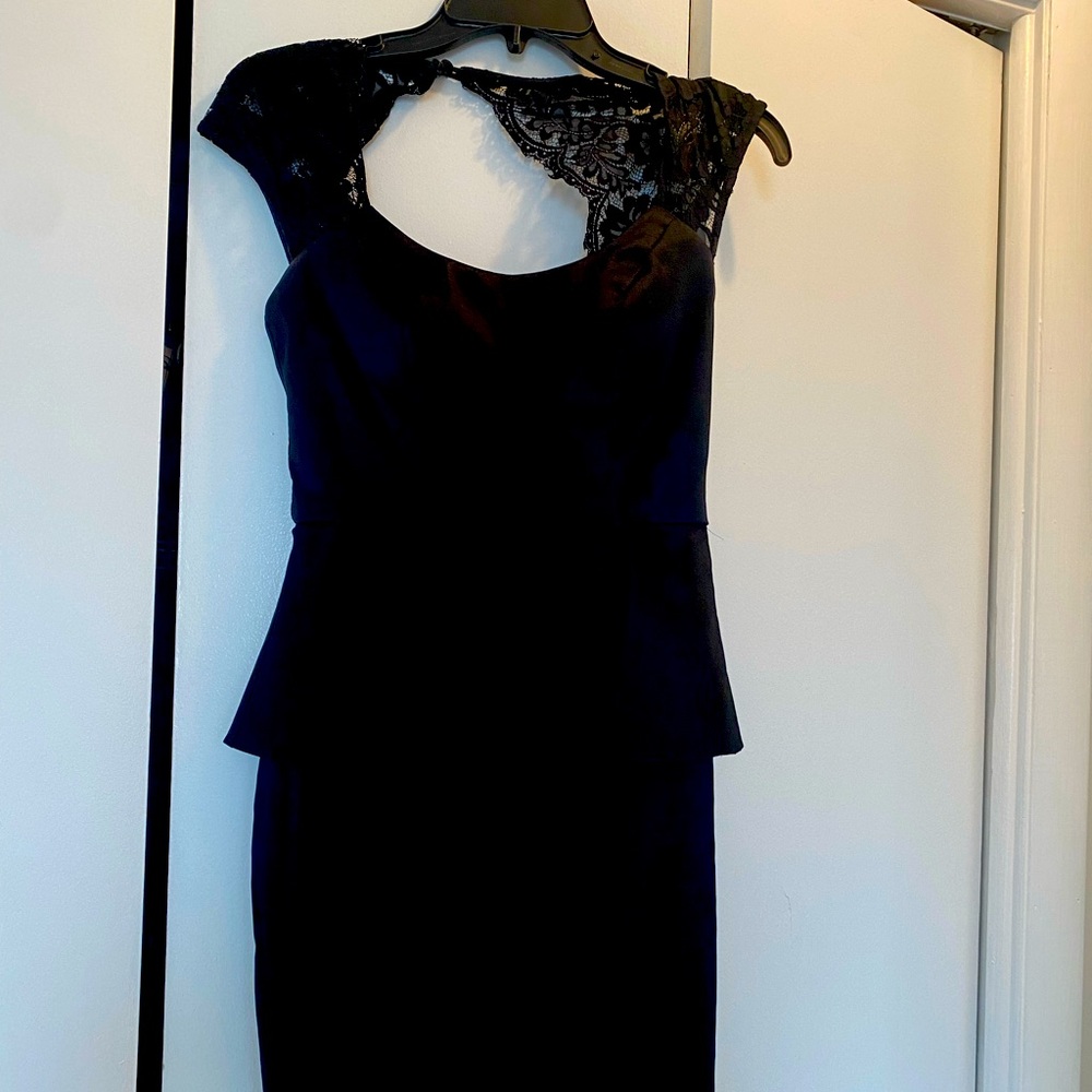 Cache dress. Size 2. Peplum style. Mini length. Great condition.